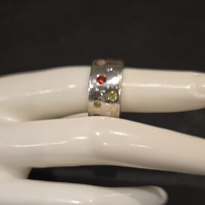 Elegant Silver Ring with Red and Green Accents